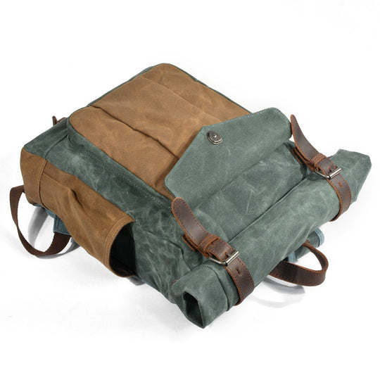 Eira | Vintage Backpack in Waxed Canvas with Roll Top Closure